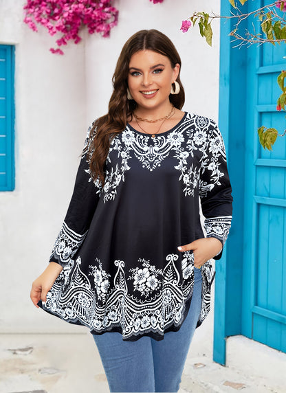 Woman wearing a black floral embroidered top in front of a blue door.