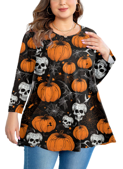 Woman wearing a Halloween-themed tunic with pumpkins and skulls.